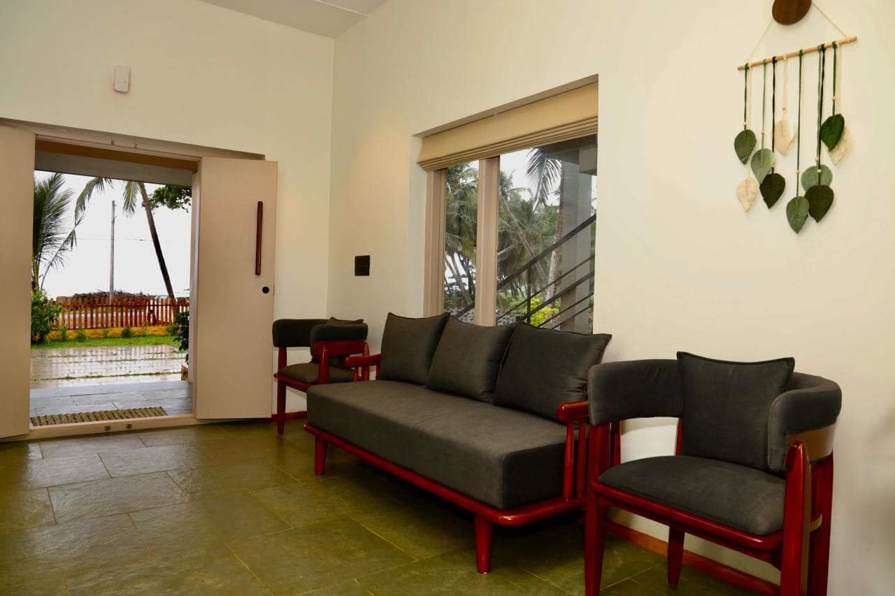 Living room with seating and natural light